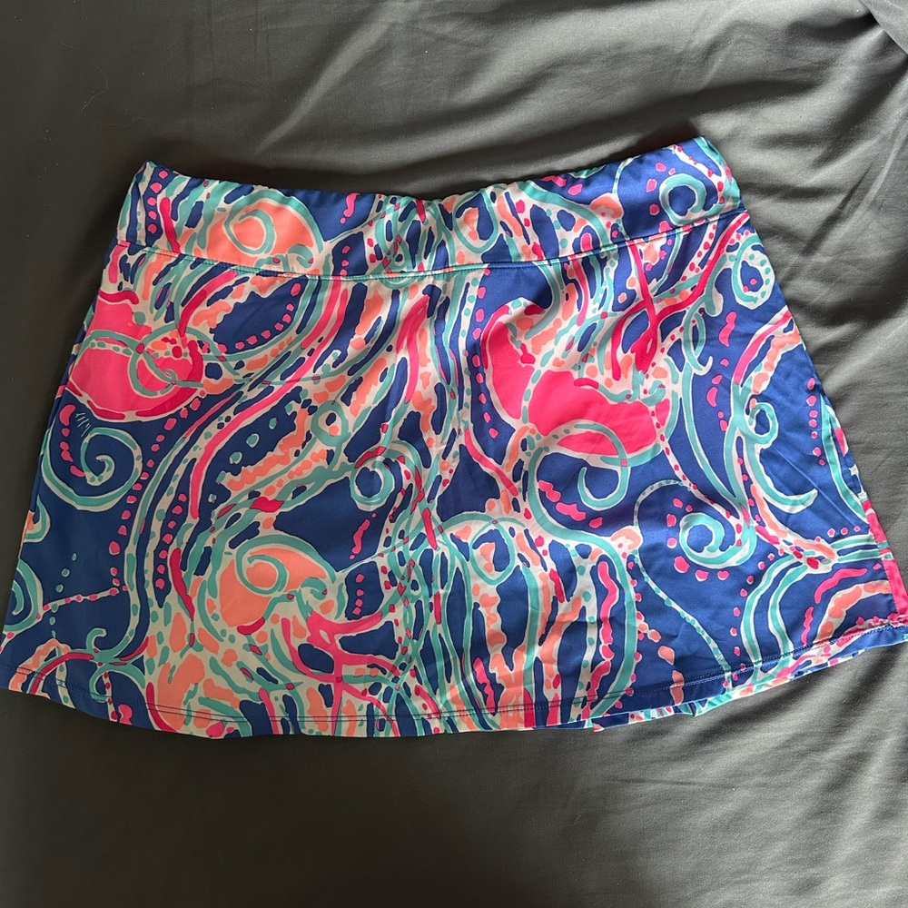 Lilly Pulitzer tennis skirt with a pink and blue jellyfish pattern